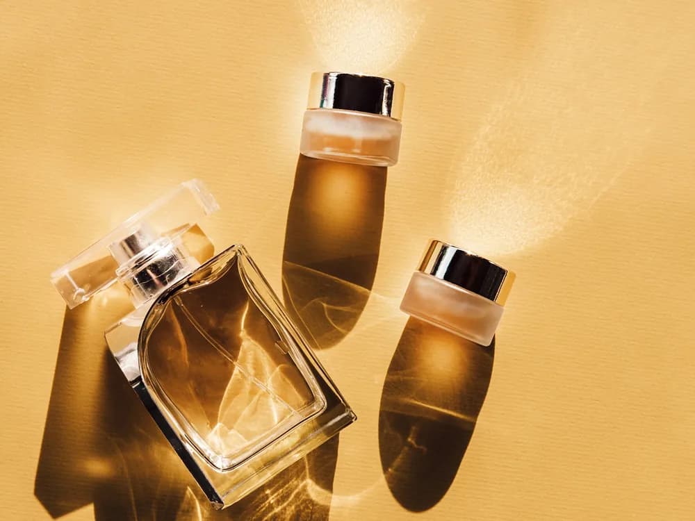 Perfume bottles on a golden backdrop