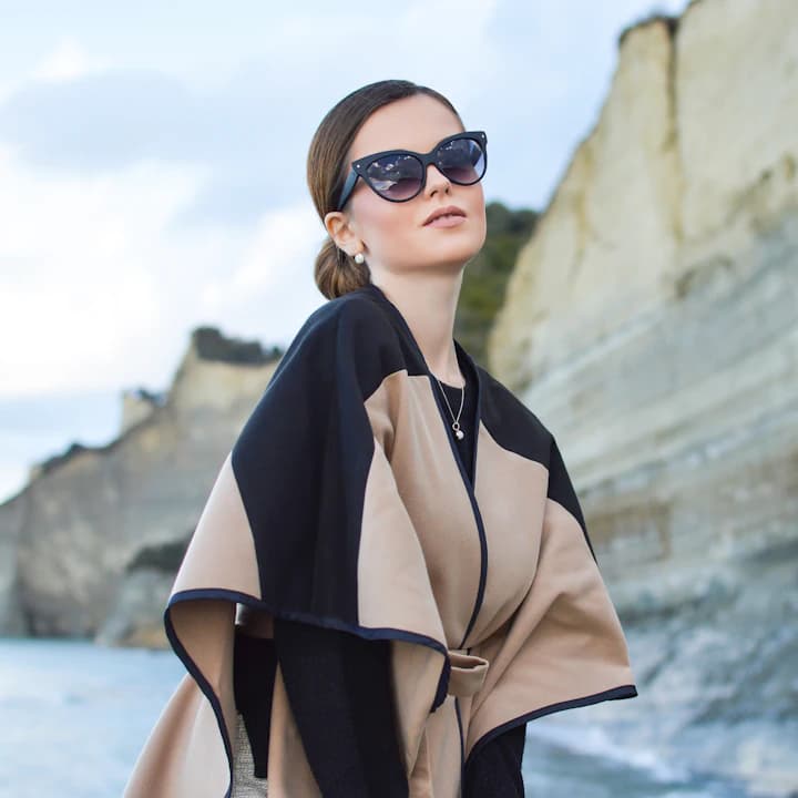 Sunglasses concept on a coastal cliff