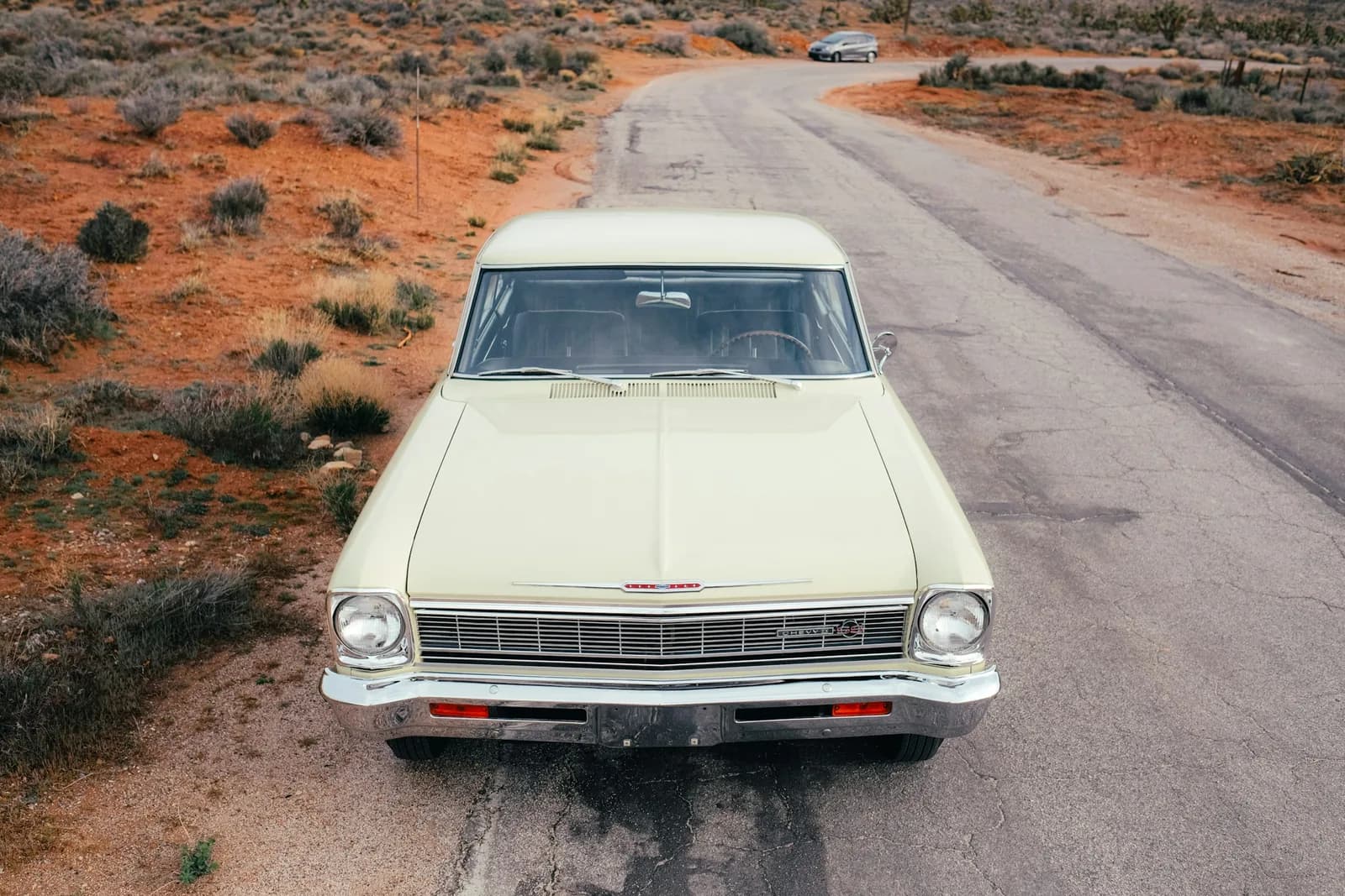 The same car on the road, facing the camera