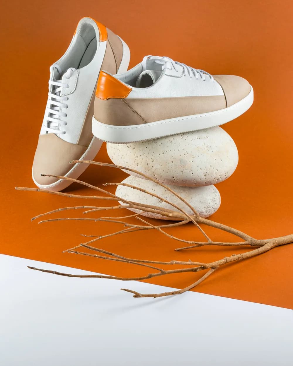 The same sneaker from above, on stones