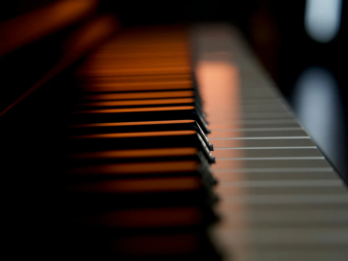 Piano keys in warm light