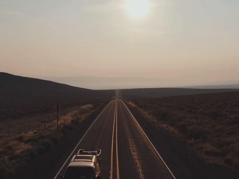 A road running to the horizon at dusk