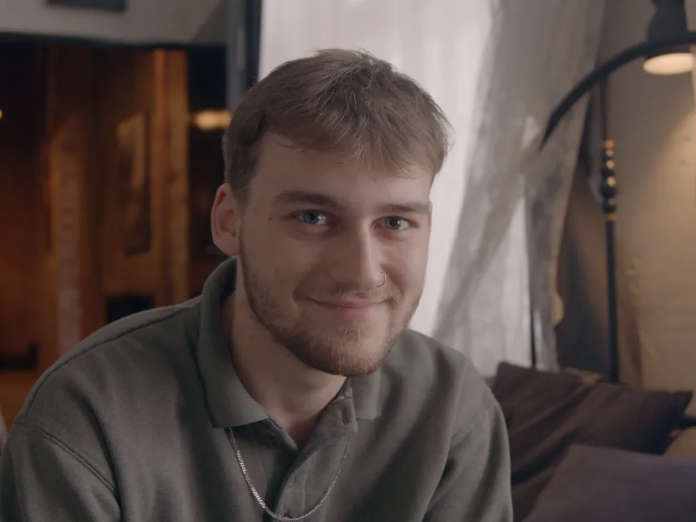A man smiling at the camera