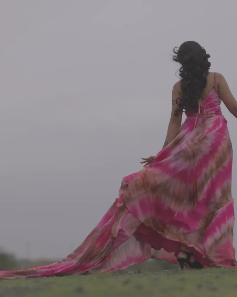 The same woman seen from behind