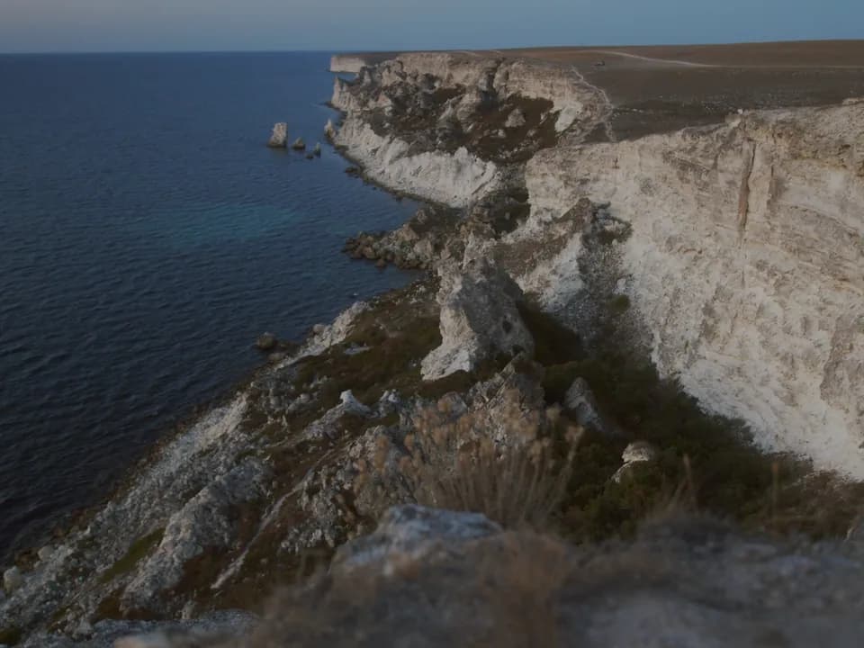 White cliffs above a dark sea