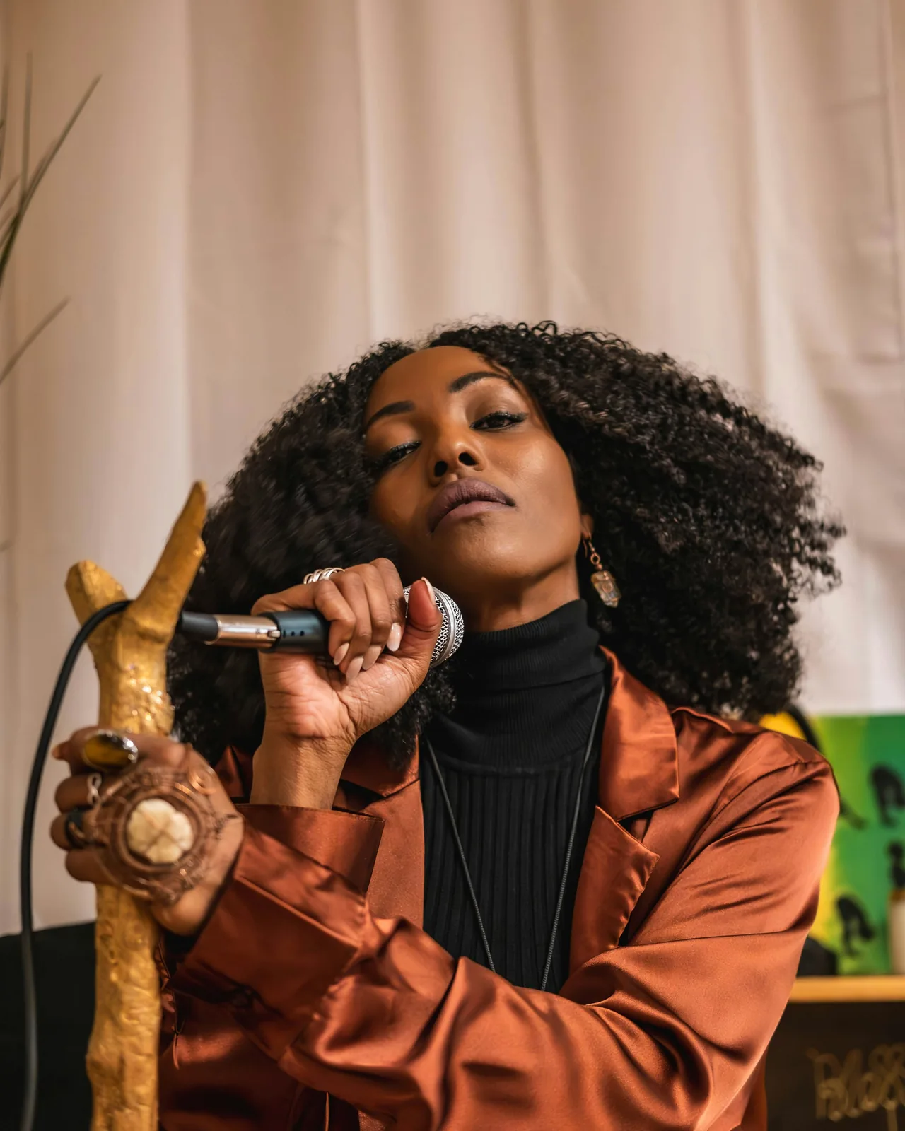 A woman singing into a microphone